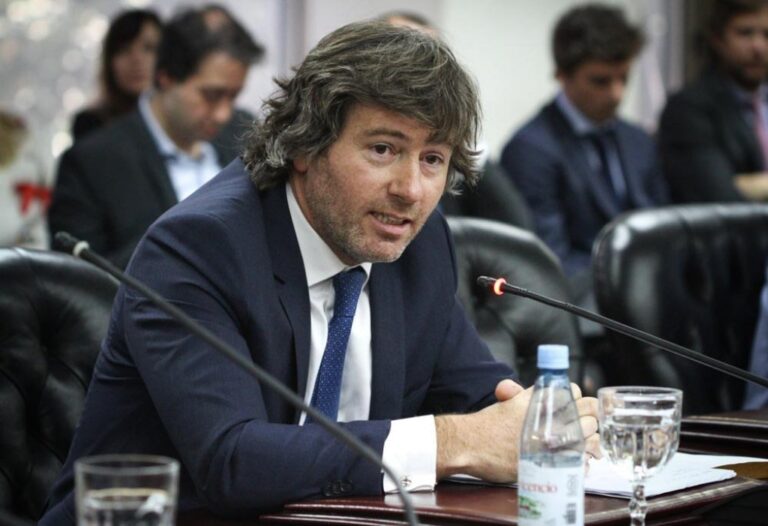 Juan Bautista Mahiques y Ariel Lijo en una reunión oficial