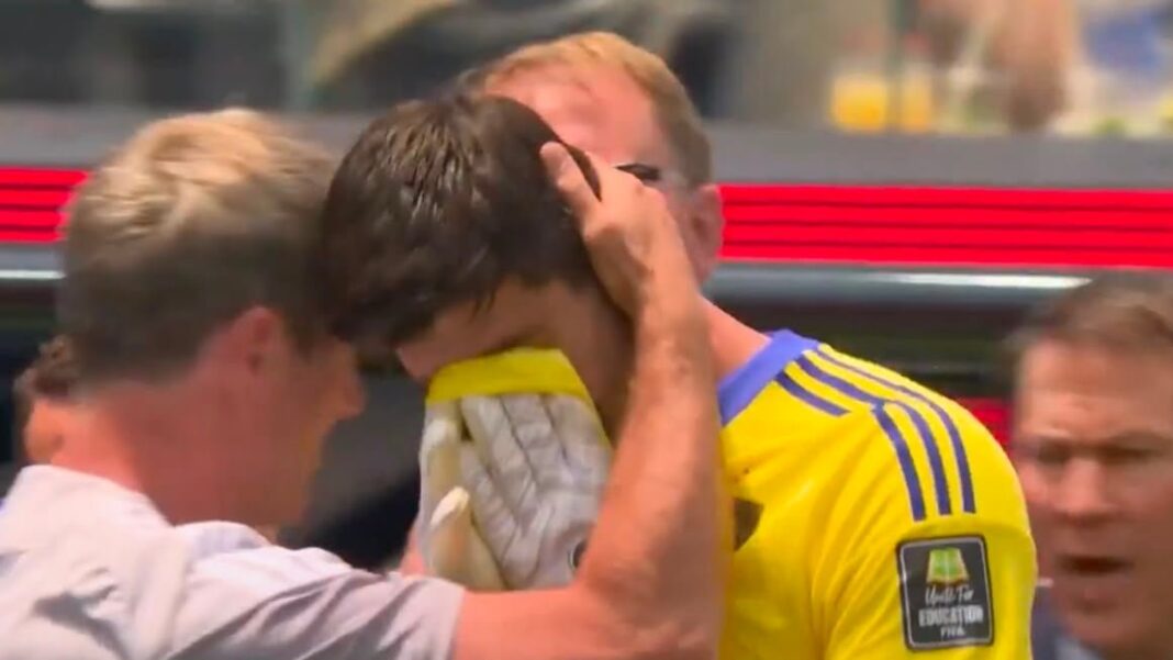 Thibaut Courtois lesionado en el césped durante el partido Bélgica vs España por los cuartos de final del Mundial 2026